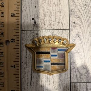 Cadillac Gold and Black Car  Emblem